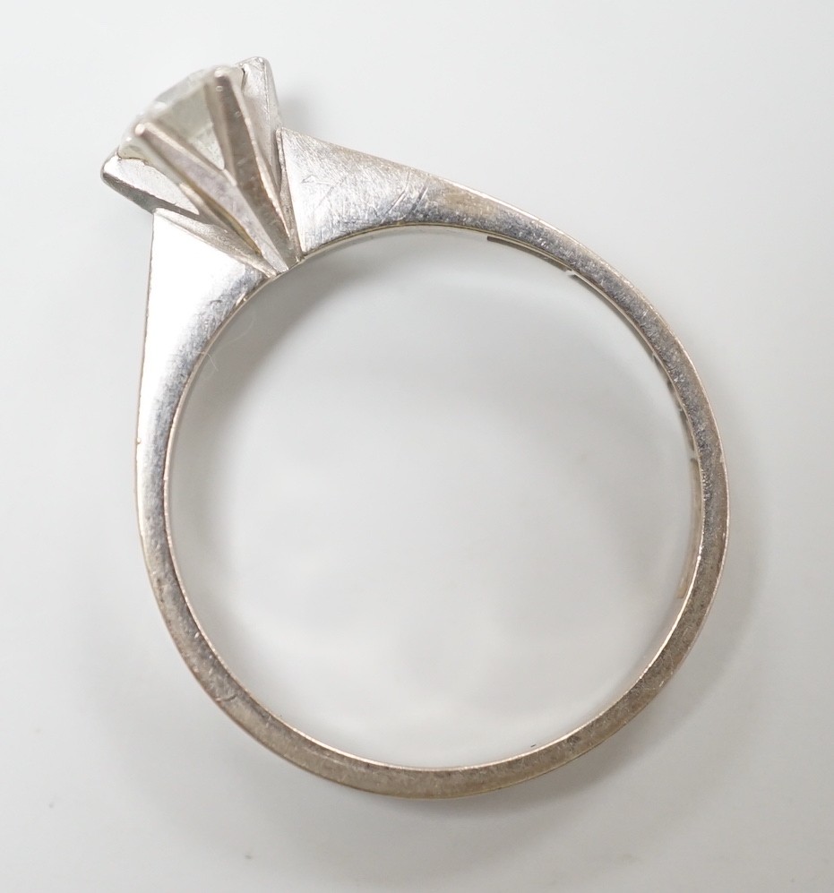 A modern Swedish 18k white metal and solitaire diamond set ring, size K, gross weight 2.6 grams